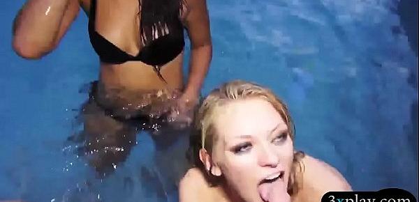  Two bikini girls sucking and fucking hard by the pool